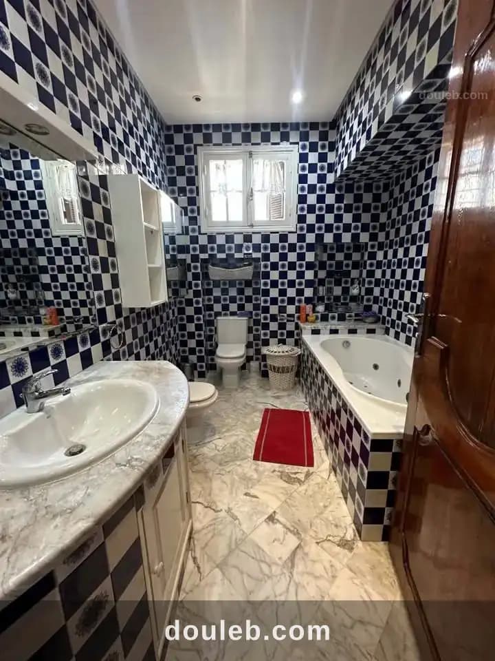 Magnifique villa avec trois niveaux i à menzah 9 - Miniature 4