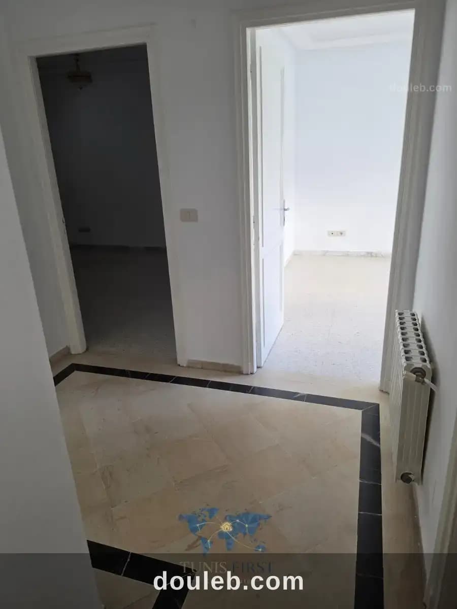 Appartement s2 vide à ennasr 2 - Miniature 4
