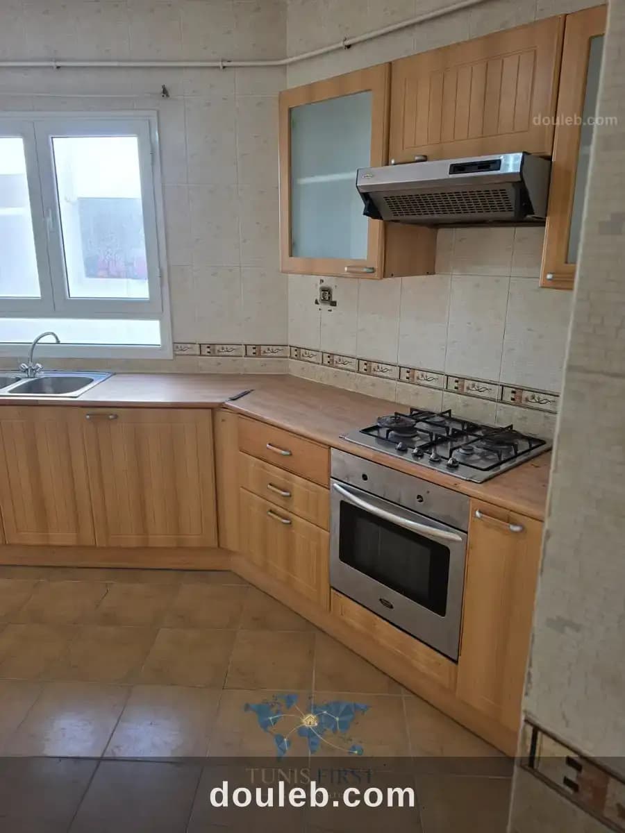Appartement s2 vide à ennasr 2 - Miniature 5