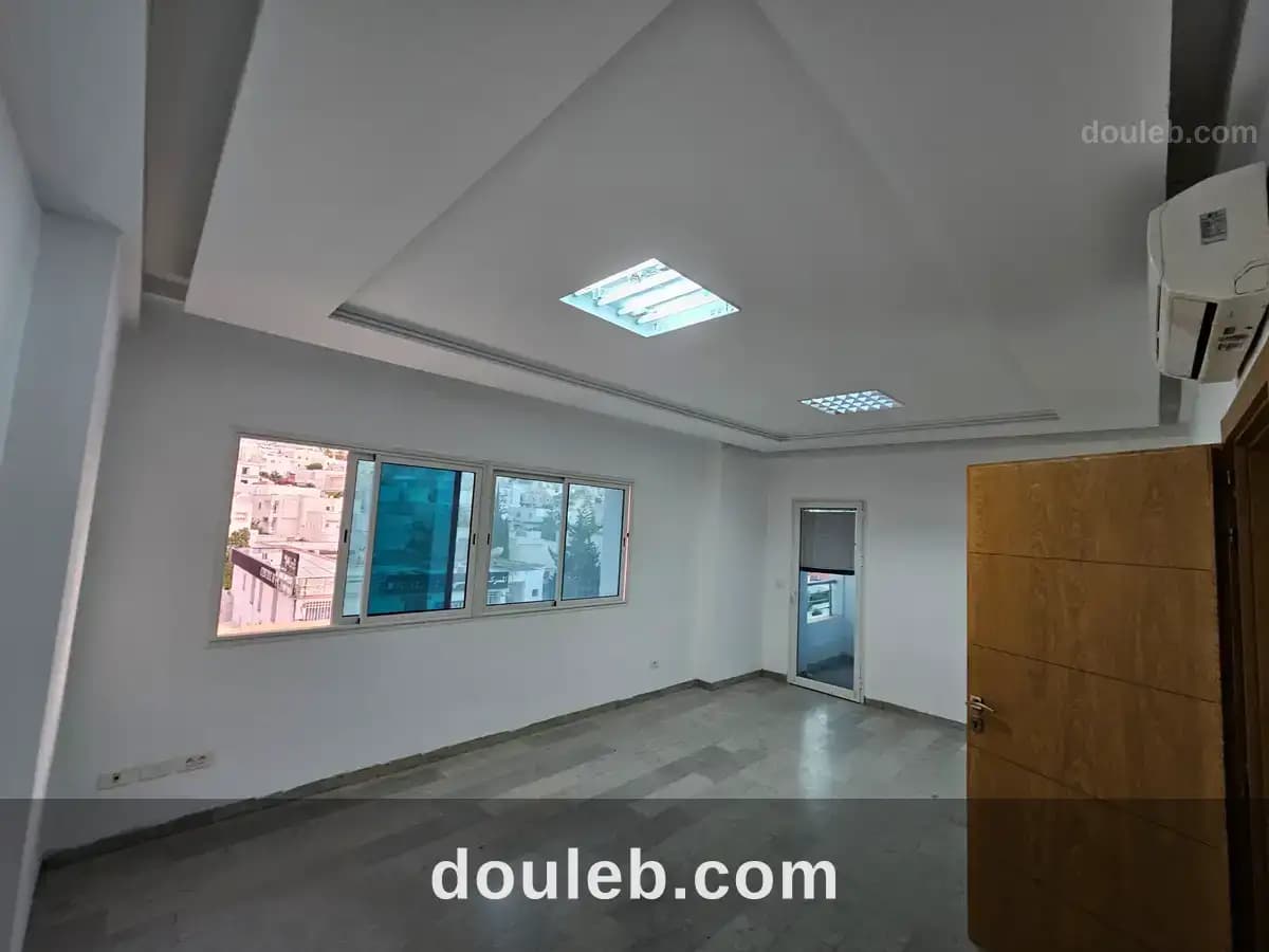 Loue bureau au centre kamoun kmc ennasr - Photo 1