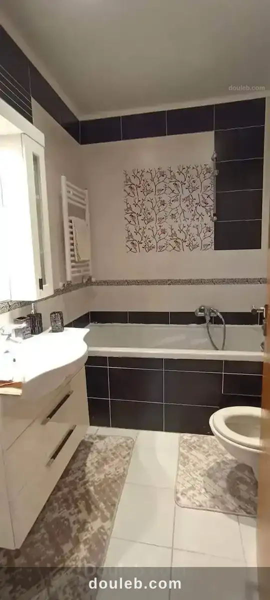 Un appartement meublé - Miniature 4