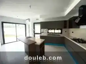 Un duplex neuf avec piscine - Miniature 4