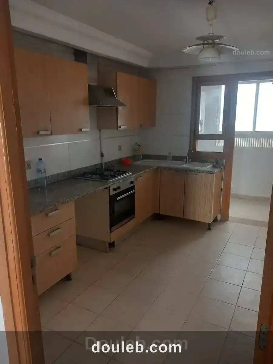 Un appartement s 2 cité nasr 2 - Miniature 3