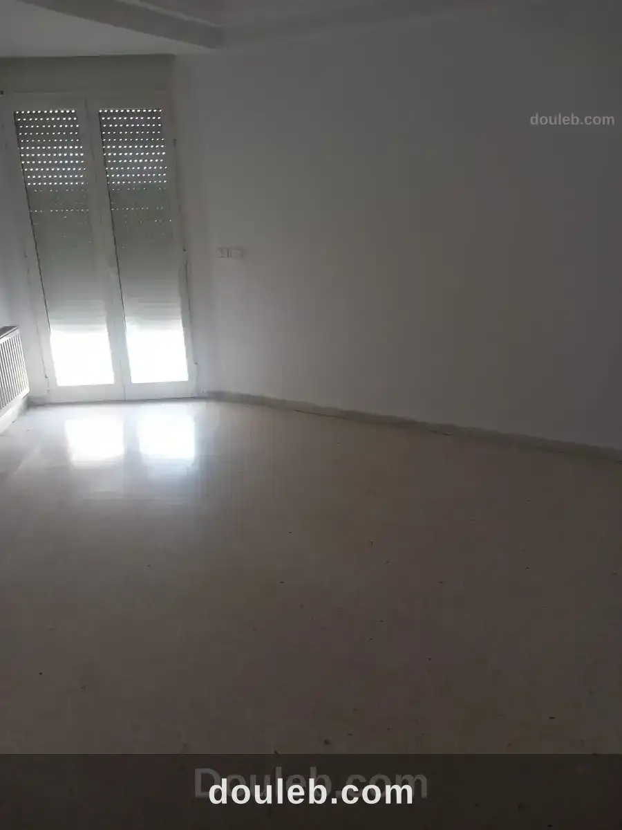 Un appartement s 2 cité nasr 2 - Miniature 4