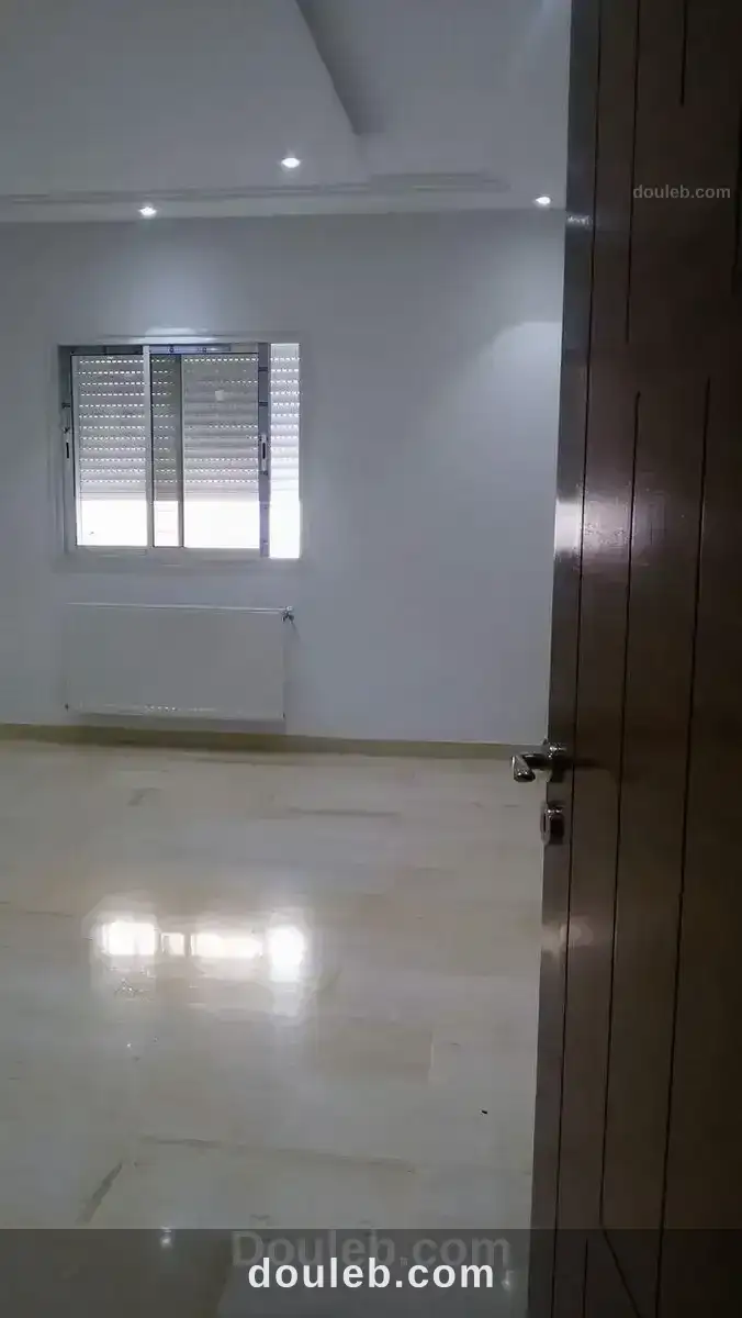 Grand appartement très haut standing cité skik - Miniature 5