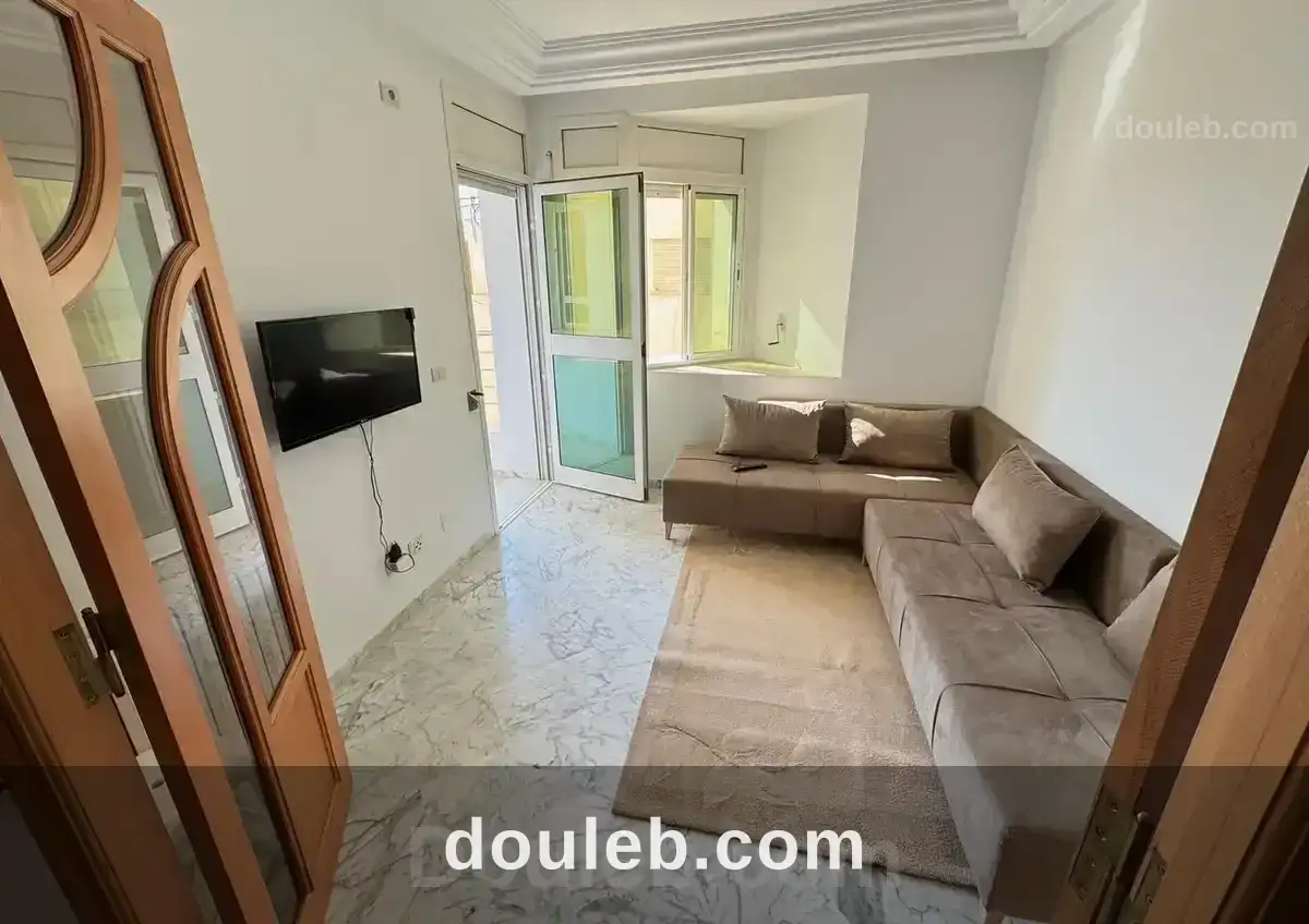 Appt s1 meublé ennaser 2 et place parking ss à Tunis