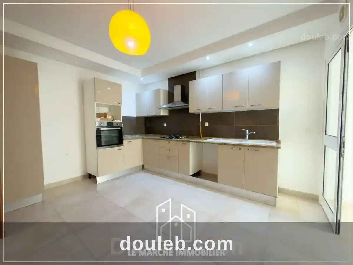 Un appartement trois chambres a ennaser - Miniature 2