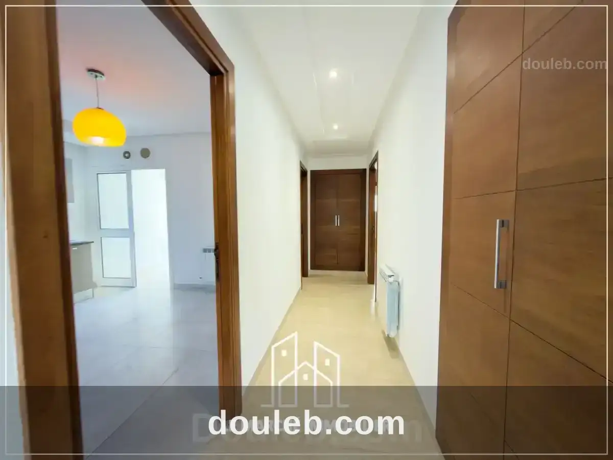 Un appartement trois chambres a ennaser - Miniature 3