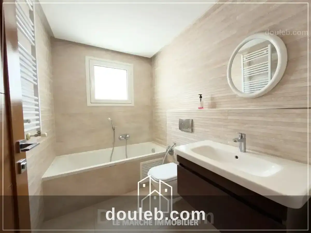 Un appartement trois chambres a ennaser - Miniature 5