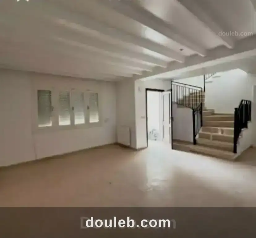 Un duplex propre avec jardin qui done sur deux rue - Photo 1