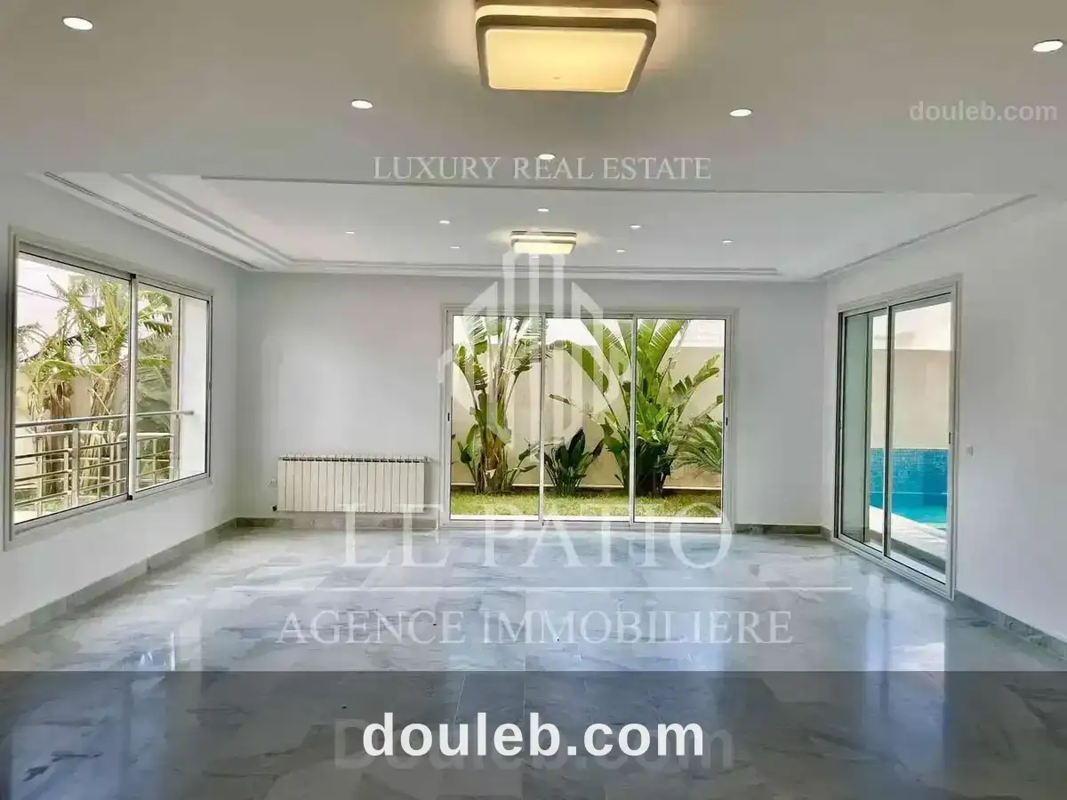 Duplex haut standing avec piscine a la marsa - Miniature 4