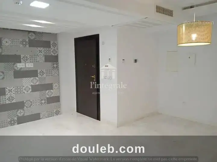 S1 vide haut standing avec place parking à Tunis