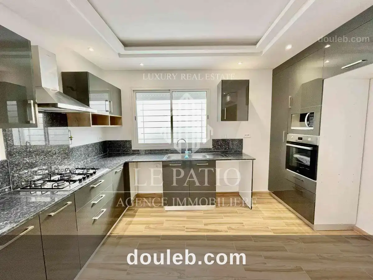 Appartement s2 rdc avec jardin - Miniature 2