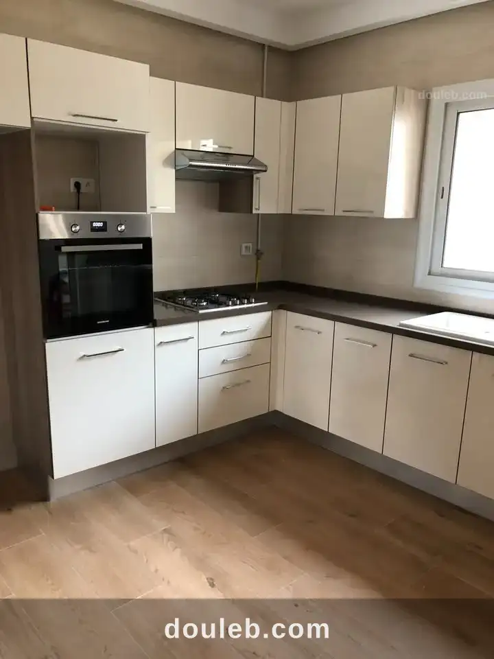 Aprt salon et 3 chambres au centre urbain nord - Miniature 2