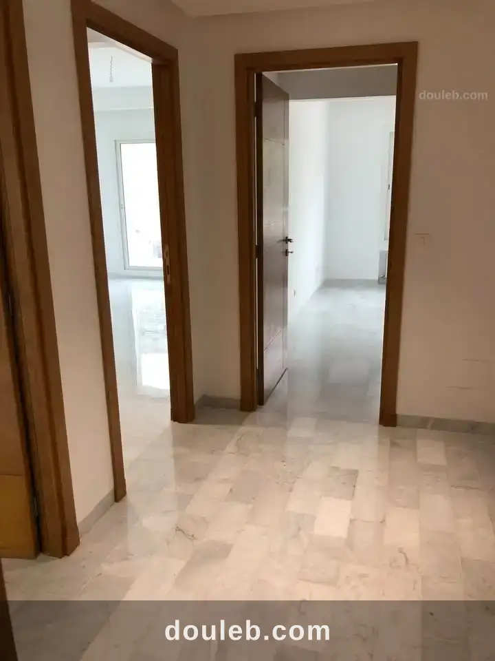 Aprt salon et 3 chambres au centre urbain nord - Miniature 3