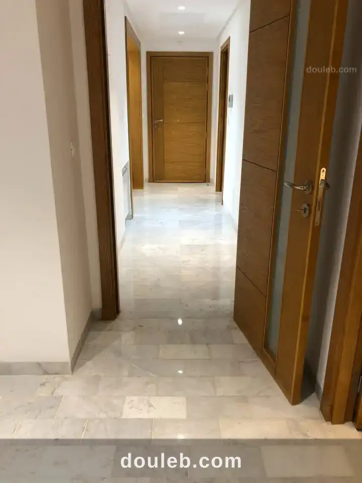 Aprt salon et 3 chambres au centre urbain nord - Miniature 4