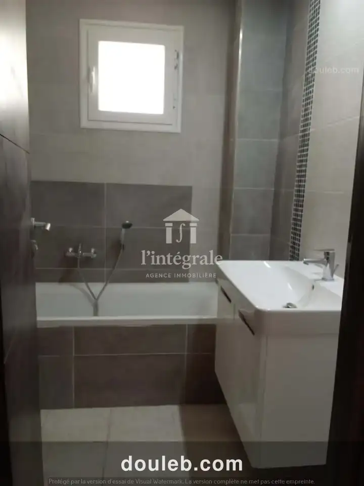 Coquet appartement s3 ennaser - Miniature 5