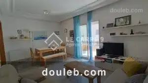 Un s2 meublé avec une vue sur lac - Miniature 2